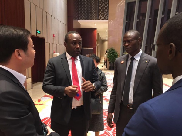 Forum des Investisseurs dans la Ville YIWU le Ministre Pape Ndong le PDG de Crestone Tirera Soura et Thiaye diaby Manager Général de Crestone