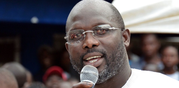 George Weah, ancienne star du football, largement élu président du Liberia George Weah, ancienne star du football, largement élu président du Liberia