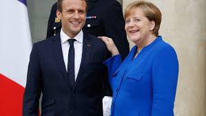 Forum de Paris : le plaidoyer de Merkel et Macron pour le multilatéralisme