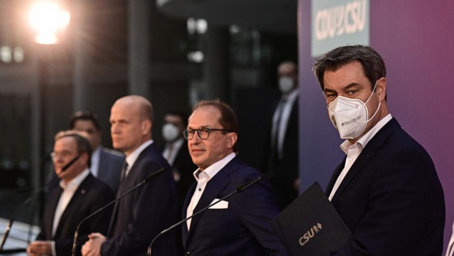 Duel pour la succession d'A. Merkel, deux hommes se disputent l'investiture des conservateurs Duel pour la succession d'A. Merkel, deux hommes se disputent l'investiture des conservateurs