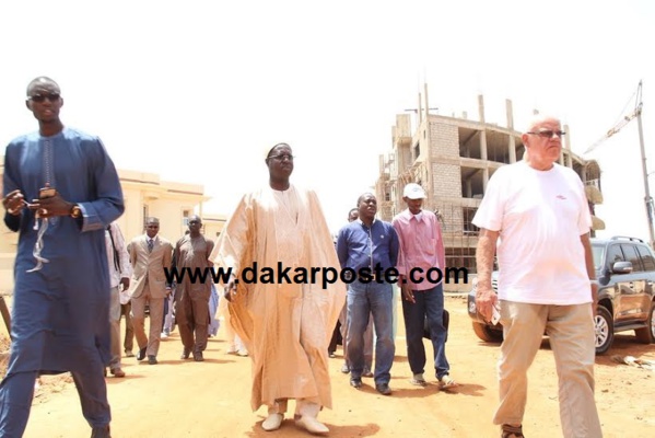 Les images de la visite du Dg de l'ARTP sur le site des deux immeubles encore en chantier