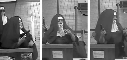 Les images de vidéosurveillance diffusées par le FBI montrent deux femmes vêtues d'une longue robe de nonne, la tête couverte d'un grand voile noir sur une guimpe blanche, pistolet au poing. © afp.
