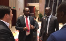 Forum des Investisseurs dans la Ville YIWU le Ministre Pape Ndong le PDG de Crestone Tirera Soura et Thiaye diaby Manager Général de Crestone