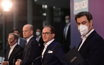 Duel pour la succession d'A. Merkel, deux hommes se disputent l'investiture des conservateurs Duel pour la succession d'A. Merkel, deux hommes se disputent l'investiture des conservateurs